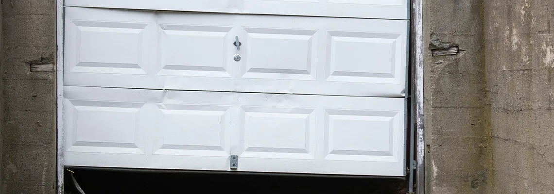 Garage Door Got Hit By A Car Dent Removal in Burbank, IL