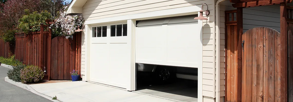 Fix Metal Garage Door Jerking in Burbank, Illinois